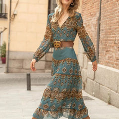 Blue patterned midi dress, V-neck bodice, long sleeves, ruffled tier skirt, waist belt