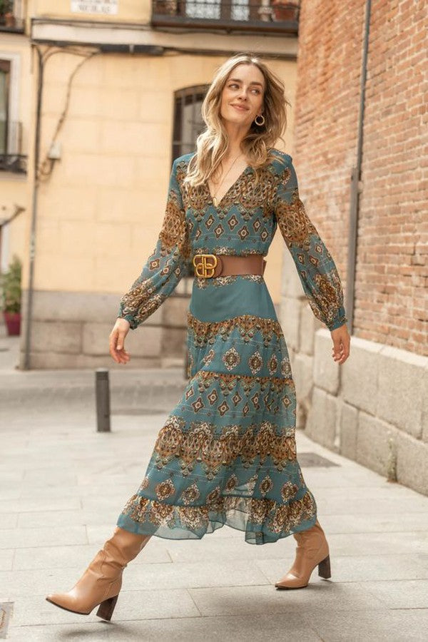 Blue patterned midi dress, V-neck bodice, long sleeves, ruffled tier skirt, waist belt
