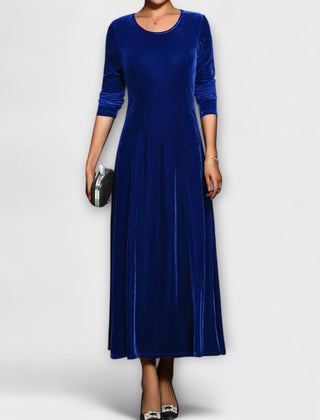 Blue soft velvet dress with long sleeves, round neck, fitted bodice and midi length skirt