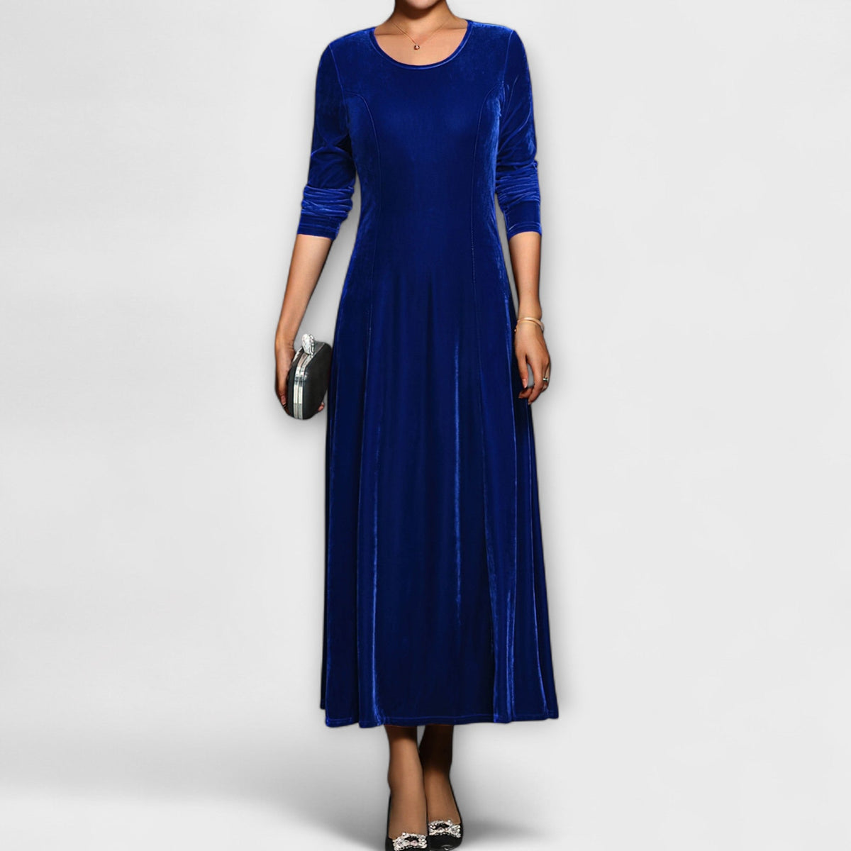 Blue soft velvet dress with long sleeves, round neck, fitted bodice and midi length skirt