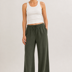 Brennan pants in dark green, wide-leg with elastic drawstring waist.
