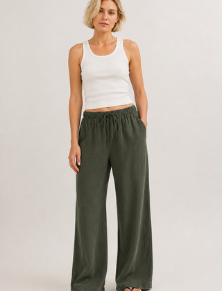 Brennan pants in dark green, wide-leg with elastic drawstring waist.