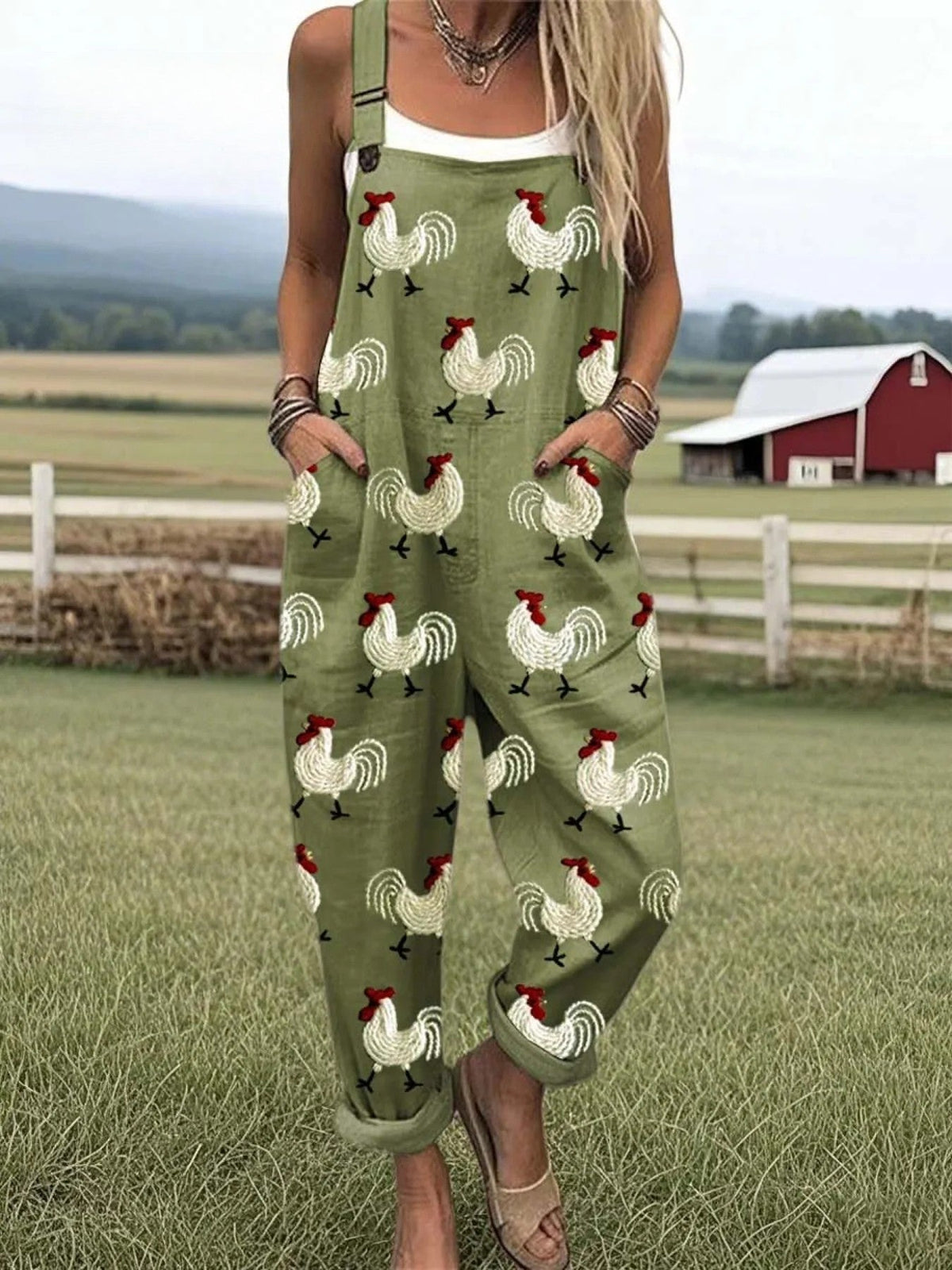 Green chicken-pattern sleeveless jumpsuit with spaghetti straps and wide legs