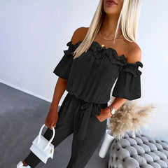 CAMILA™ off-shoulder frill tie-waist jumpsuit in black with ruffled off-shoulder detail