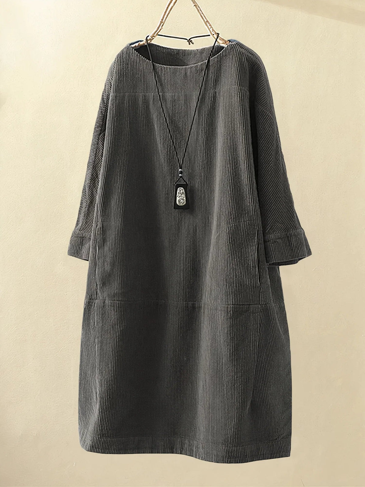 Gray corduroy tunic dress with round neckline and 3/4 sleeves