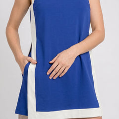Blue sleeveless tunic dress with white side panels and sleeveless armhole trim