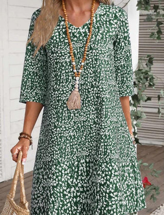 Boho Bloom dress in green daisy print, scoop neck, three-quarter sleeves, tiered skirt
