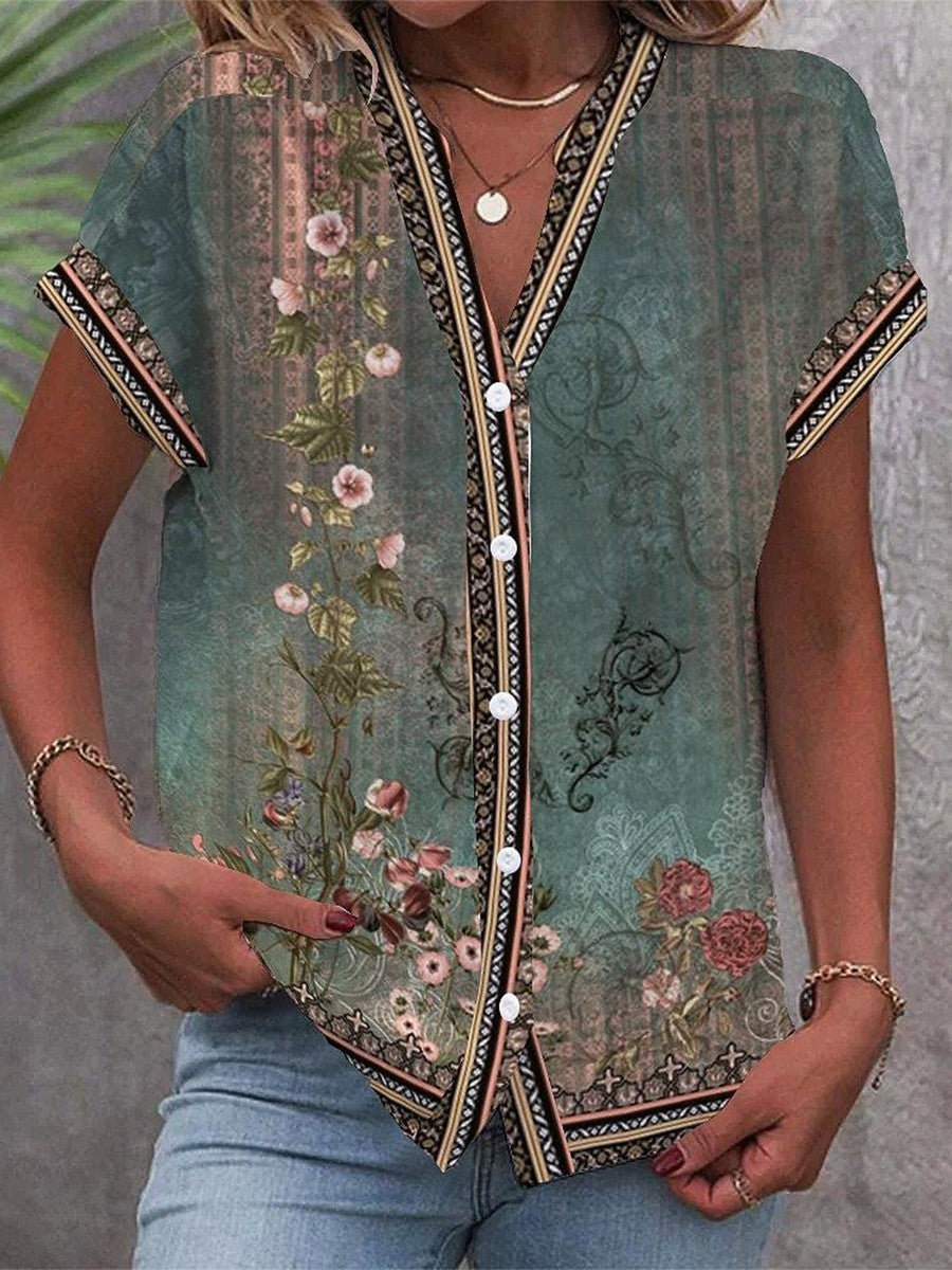 Green watercolor petal blouse with V-neck and embroidered border trim, button front