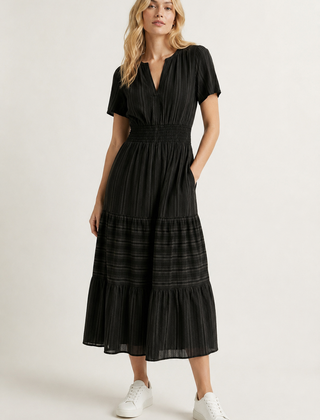Black tiered midi dress with short sleeves, V-neck and smocked waist