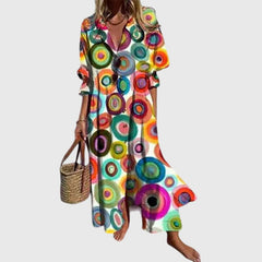 Rainbow bohemian dress with bold circle print, V-neck, short sleeves, flared hem