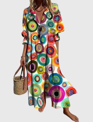 Rainbow bohemian dress with bold circle print, V-neck, short sleeves, flared hem