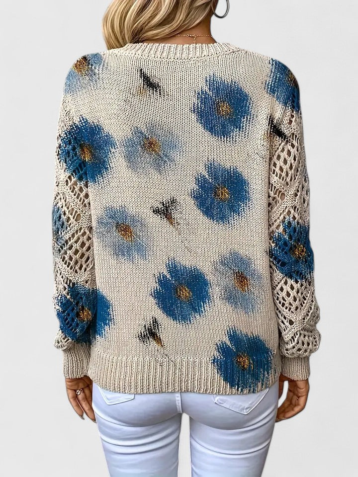 Cream knit cardigan with blue flower and bird pattern, V-neck and openwork sleeves