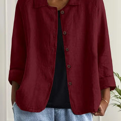 Wine red button-front light top with pointed collar and three-quarter sleeves