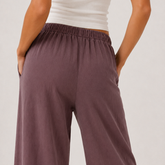 Brennan wide-leg pants in dusty lilac, side view with gathered elastic waistband