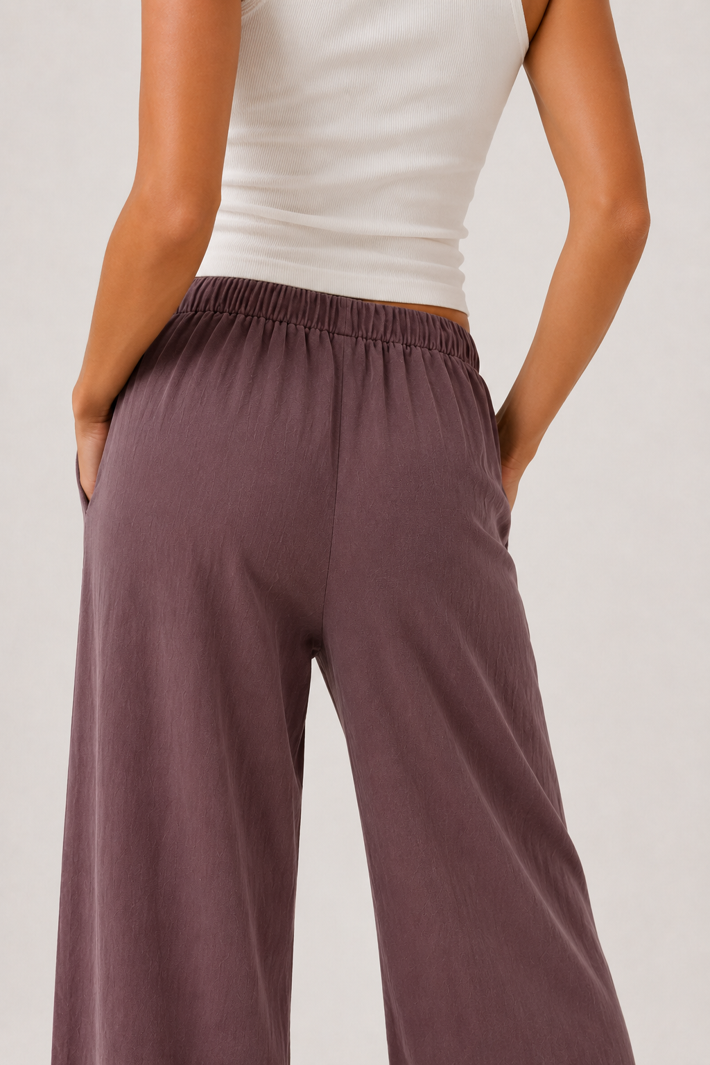 Brennan wide-leg pants in dusty lilac, side view with gathered elastic waistband