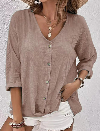 Taupe V-neck button-front top with loose three-quarter sleeves.