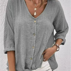 Heather gray V-neck button-front top with loose three-quarter sleeves.