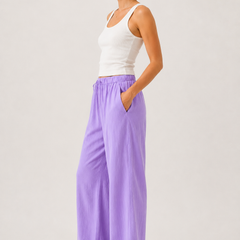 Lavender wide-leg pants with drawstring waist and back keyhole detail
