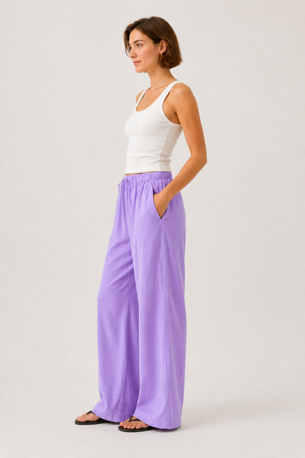 Lavender wide-leg pants with drawstring waist and back keyhole detail