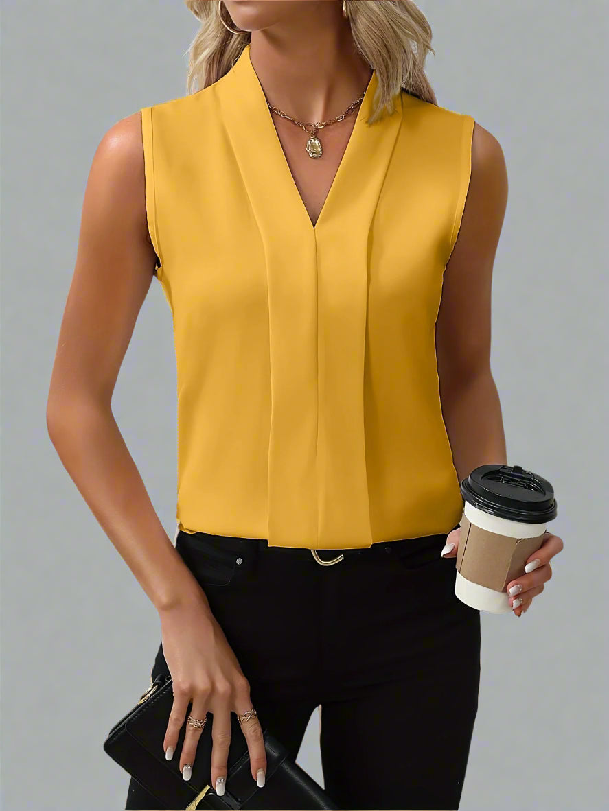 Yellow sleeveless V-neck blouse with front pleats