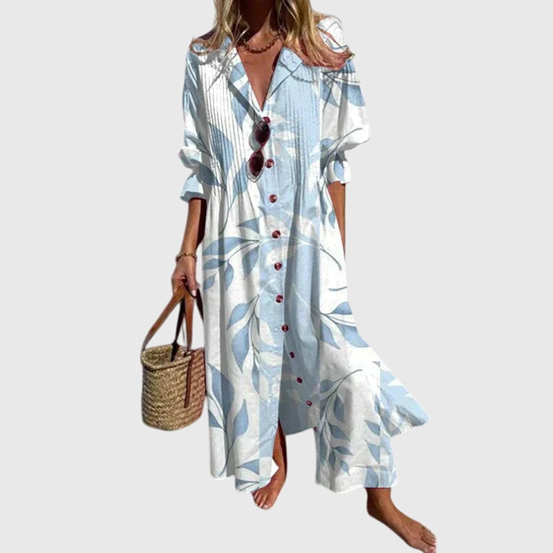 Light blue bohemian dress with botanical print, button-front V-neck, short sleeves