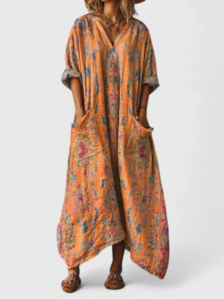 Orange and blue patterned V-neck long dress, short batwing sleeves, side pockets