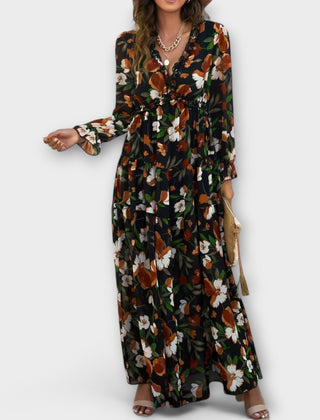 Black floral maxi dress with V-neck, long sleeves, and tiered skirt