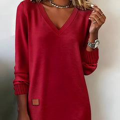 Red V-neck midi dress with 3/4 sleeves, ribbed striped cuffs, square side patch