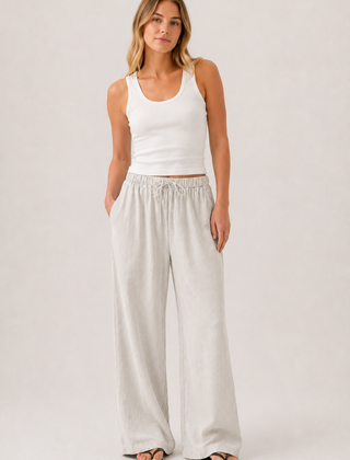 Brennan pants in light off-white with elastic waist and wide relaxed legs