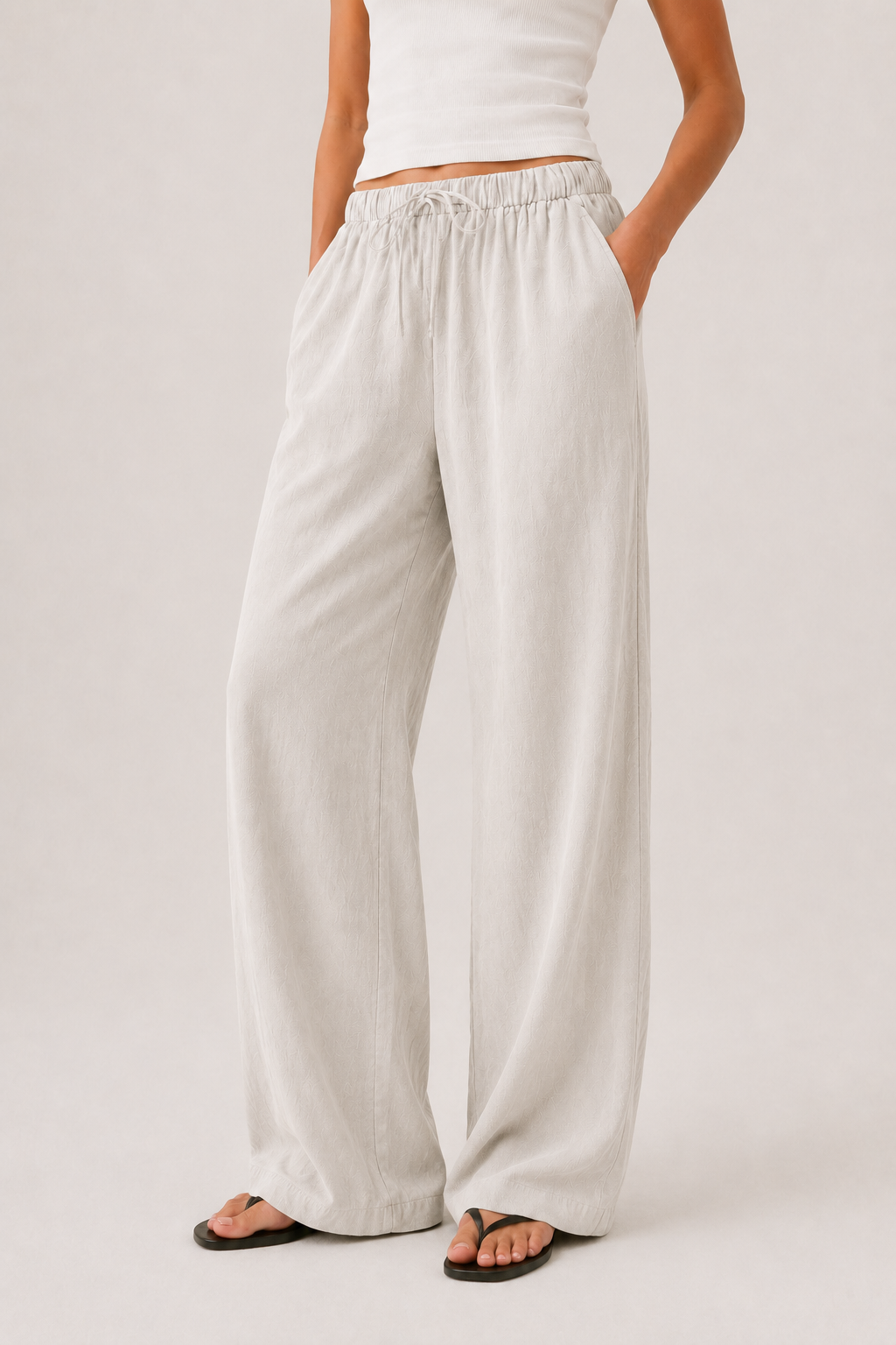 Brennan pants, light off-white, elastic waistband and full-length wide leg