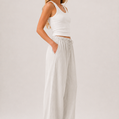 Brennan pants light off-white with elastic waist and wide-leg full-length fit