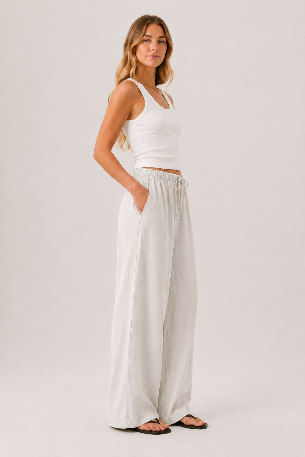 Brennan pants light off-white with elastic waist and wide-leg full-length fit