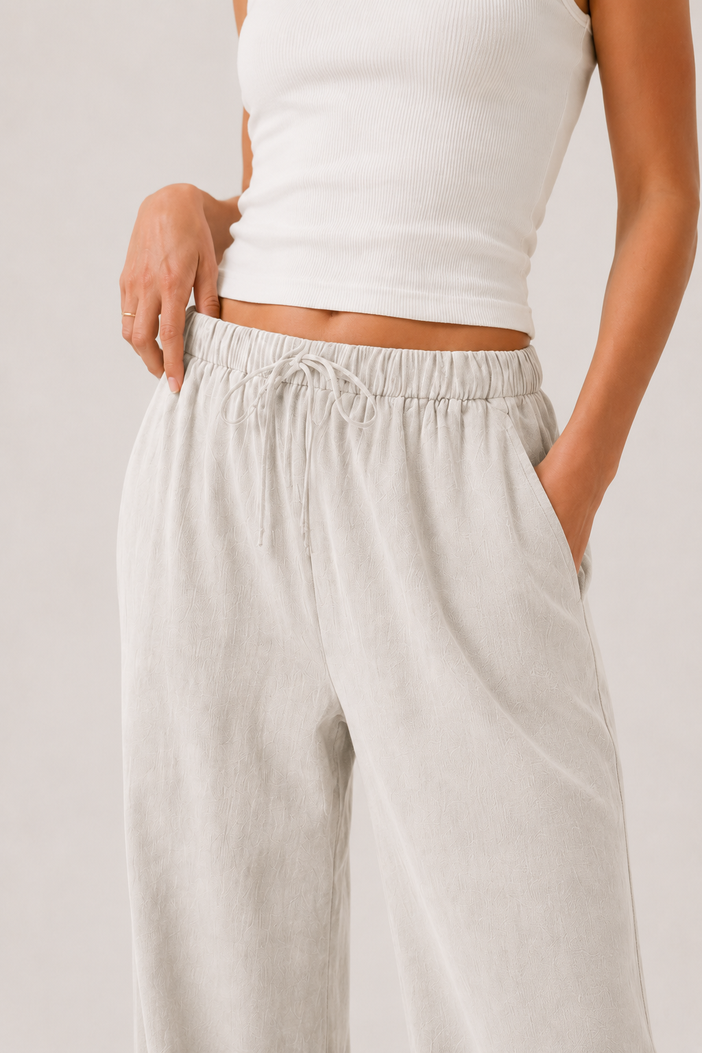 Brennan pants light off-white with elastic drawstring waist and relaxed wide silhouette
