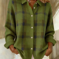 Green plaid knit vest with V-neck, button front, long sleeves, ribbed cuffs.
