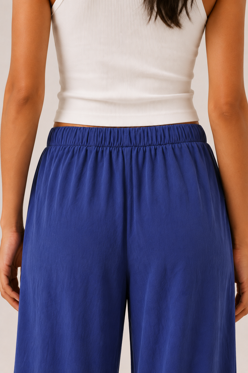 Brennan pants in cobalt blue, close-up elastic waistband and gathered fabric