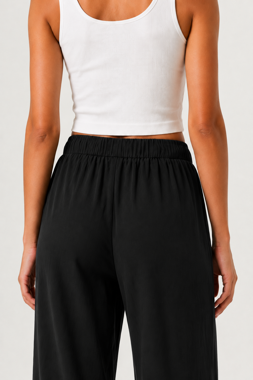 Brennan wide-leg pants in black, elastic waist and relaxed straight legs