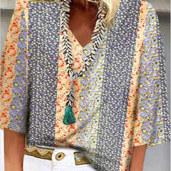 Multicolor floral-print blouse with V-neck tassel trim and flared sleeves