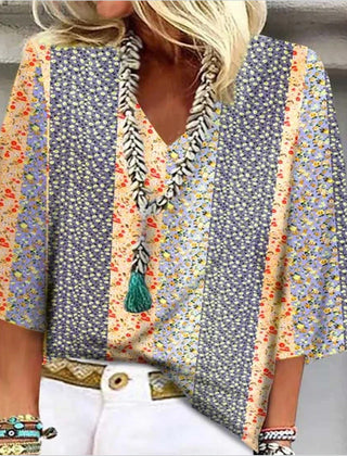 Multicolor floral-print blouse with V-neck tassel trim and flared sleeves