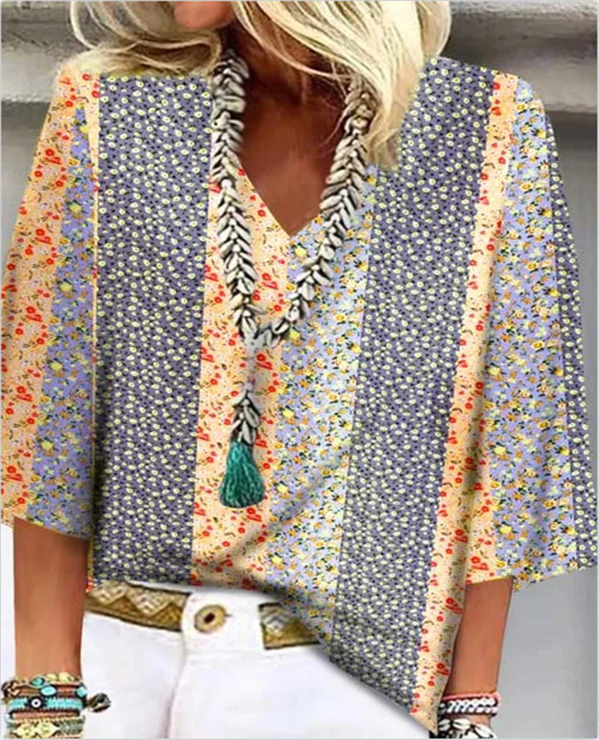 Multicolor floral-print blouse with V-neck tassel trim and flared sleeves