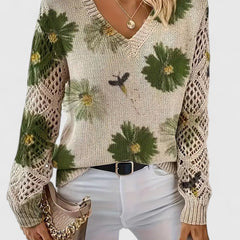 Cream V-neck cardigan with green flower and bird pattern, openwork knit sleeves