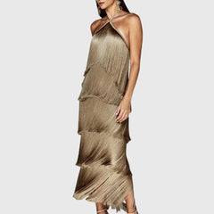 Gold halter tassel dress with layered fringe tiers and sleeveless halter straps