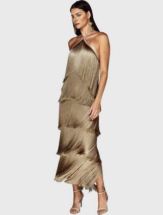 Gold halter tassel dress with layered fringe tiers and sleeveless halter straps