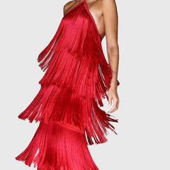 Red tassel halter dress with layered fringe tiers and crisscross straps