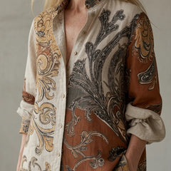 Paisley print button-up shirt in cream, brown, and dark gray with rolled sleeves