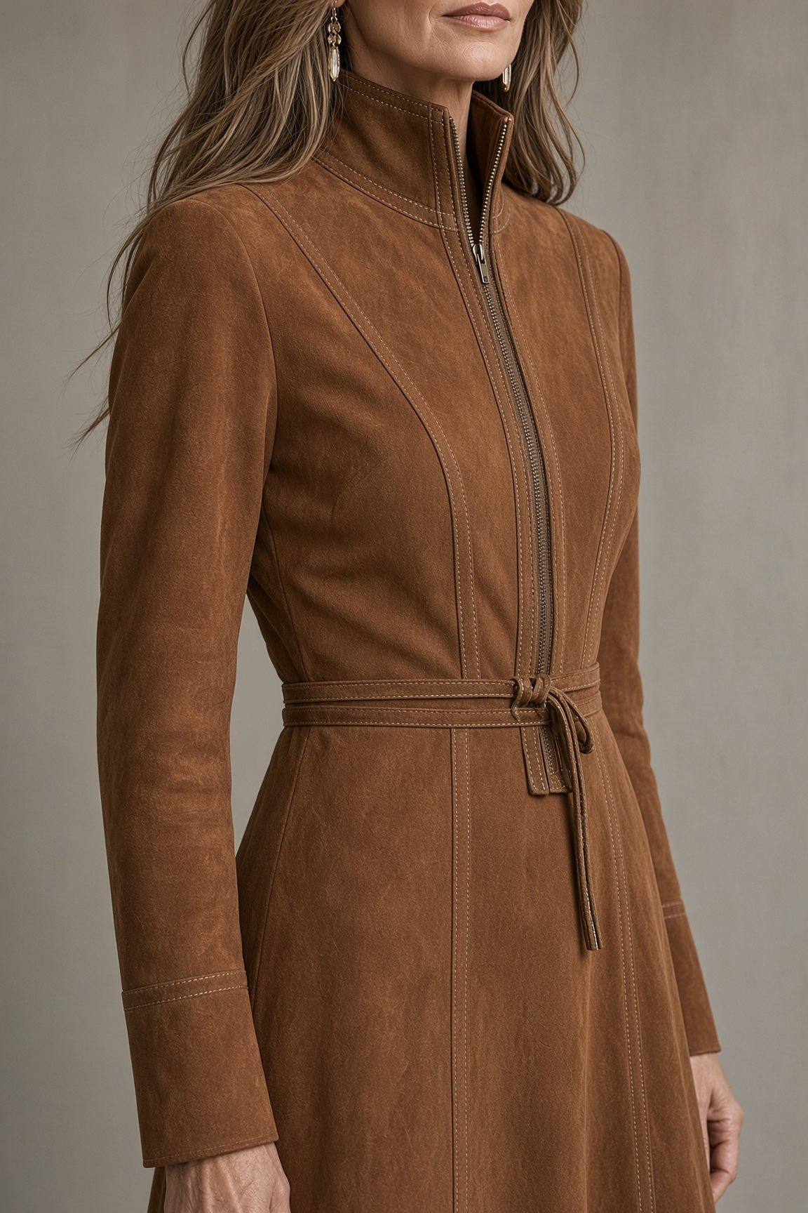 Brown suede dress with front zipper, tied waist, stand collar, long sleeves