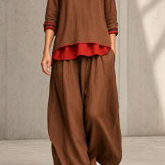Women's brown tunic and wide-leg pants set with red ruffle hem and rolled cuffs