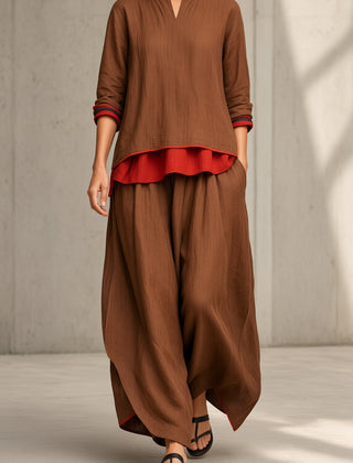 Women's brown tunic and wide-leg pants set with red ruffle hem and rolled cuffs