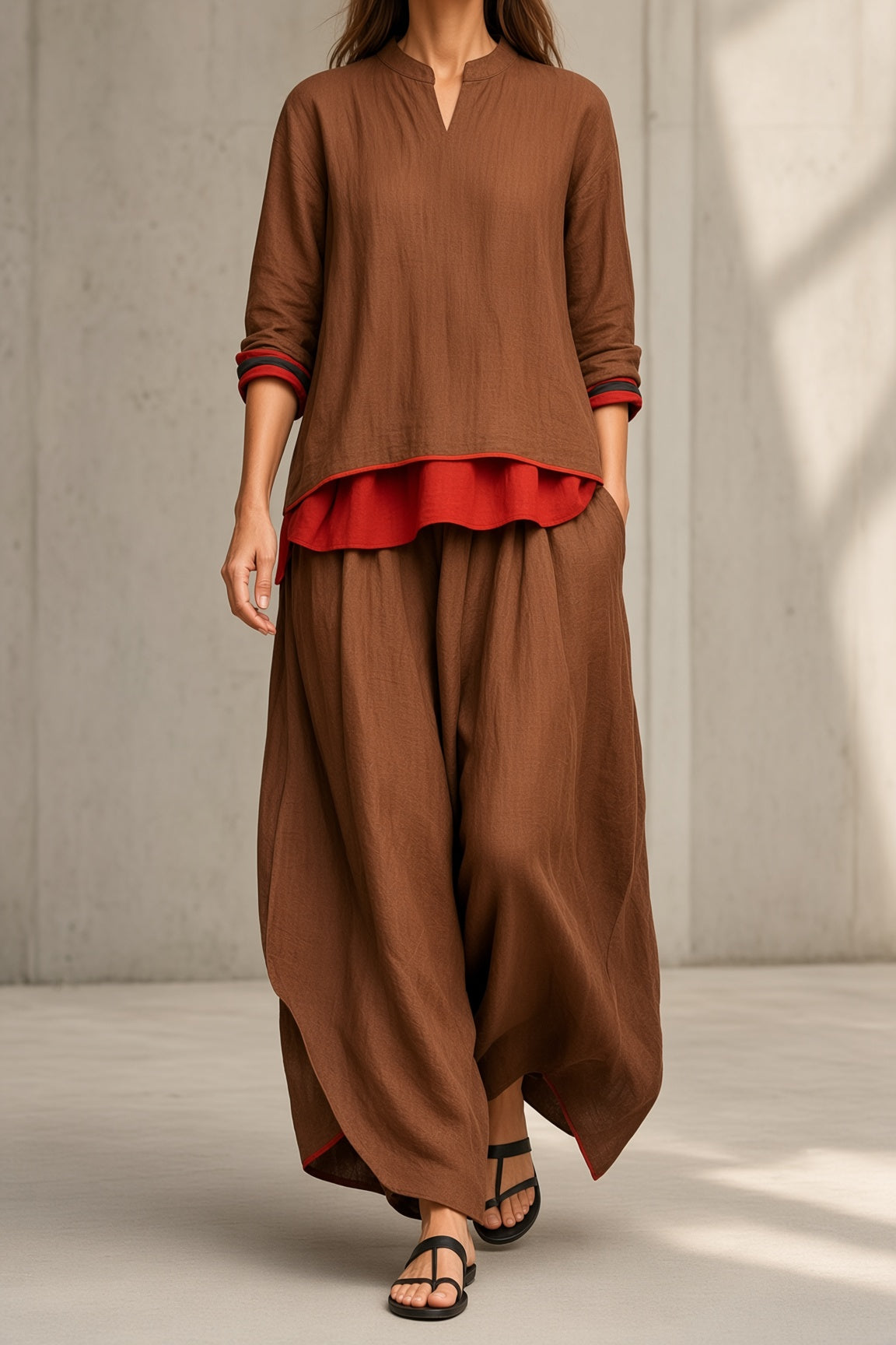 Women's brown tunic and wide-leg pants set with red ruffle hem and rolled cuffs