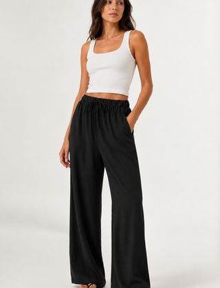 Brennan pants in black, wide-leg flowy style with elastic waistband