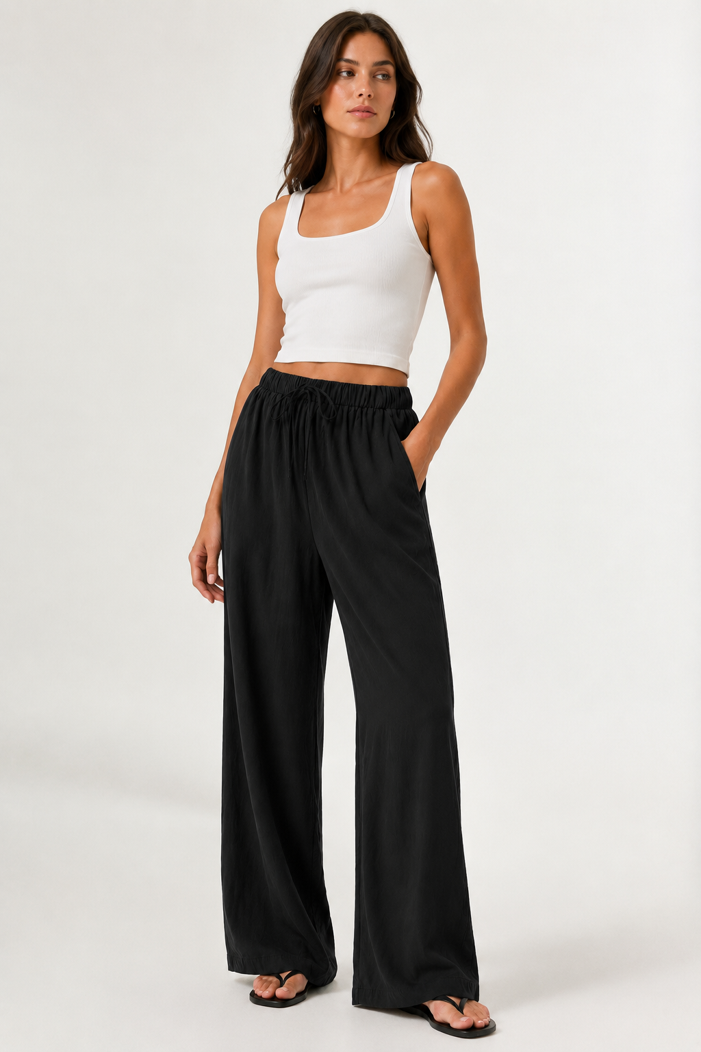 Brennan pants in black, wide-leg flowy style with elastic waistband